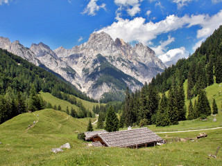 Small cabin grassy field mountains - a small cabin free wallpaper