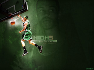 Basketball player green uniform jumping - a green uniform free wallpaper