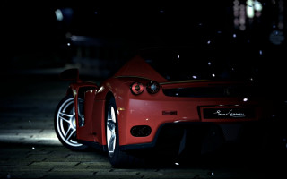 Red sports car night snow 2 - photorealistic lighting free wallpaper