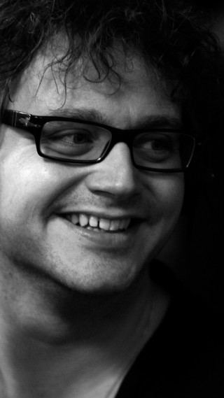 Man glasses smiling cellphone photorealism - glass free wallpaper for mobile