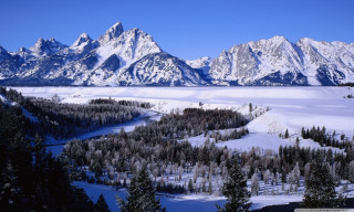 Snowy landscape mountains trees river 2 - the background and trees free wallpaper