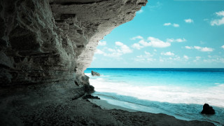Person rock ocean cliff blue 2 - exekia free wallpaper for desktop