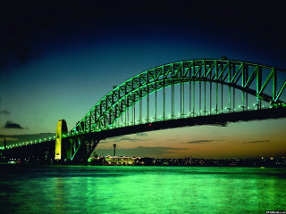 Large bridge night water green 4 - a large bridge over a body of water free wallpaper