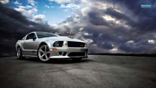 Silver mustang parking lot cloudy 2 - stormy weather free wallpaper