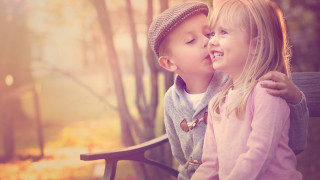 Boy girl bench woods kissing - free love wallpaper