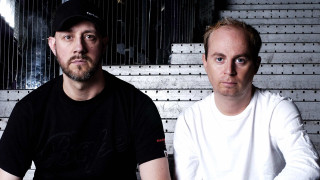 Two men sitting wall clock - face free wallpaper for desktop