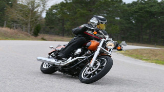 Man motorcycle curvy road forest - a forest free wallpaper