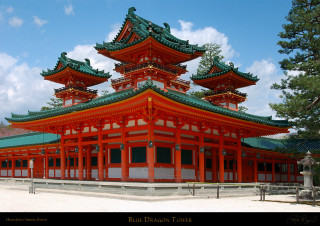 Red building green roof sky 2 - a red building free wallpaper