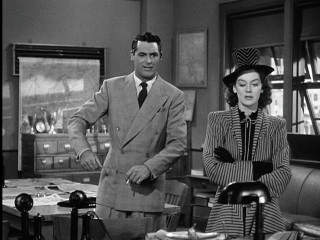 Man woman standing room desk - cleve gray free wallpaper