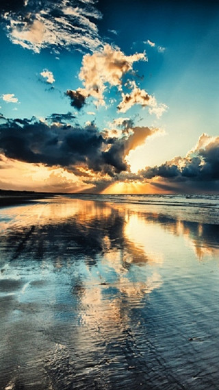 Beach sunset clouds reflection water - a sunset free wallpaper for mobile