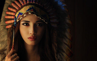 Woman headdress stick serious look - holding free wallpaper