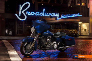 Blue motorcycle parked restaurant sign - a neon free wallpaper for desktop
