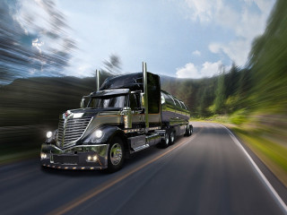 Semi truck driving road trees - dennis flanders free wallpaper