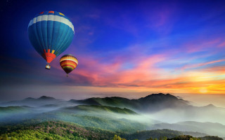 Hot air balloon over green 2 - a hot air balloon free wallpaper