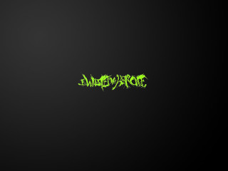 Black background green lettering says - the middle of the image free wallpaper