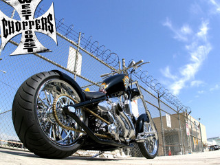 Motorcycle parked fence barbed wire - a fence free wallpaper