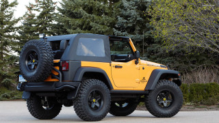 Yellow jeep trees bushes parking - a black tire free wallpaper