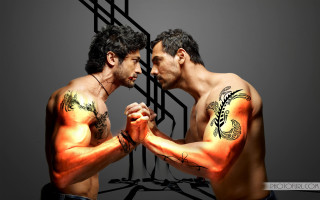Two men tattoos touching hands - touching free wallpaper