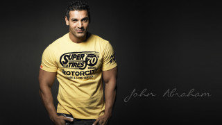 Man yellow shirt pose hands 2 - his hands in his pockets free wallpaper