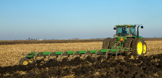 Tractor plowing field plow background - a tractor free wallpaper