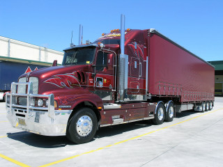 Red semi truck parking lot 2 - anson maddock free wallpaper