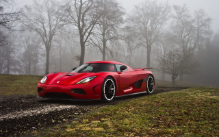 Red sports car foggy road 2 - a foggy day free wallpaper