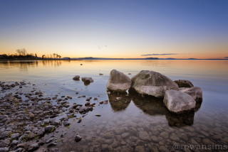 Lake rocks water sunset sky - wide angle len free wallpaper