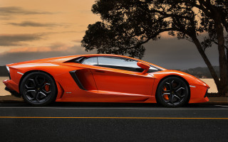 Orange sports car water sunset - nice free wallpaper