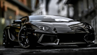 Black sports car street building - a black sports car free wallpaper