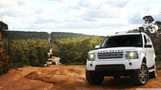 White land rover dirt road - a dirt road in front free wallpaper