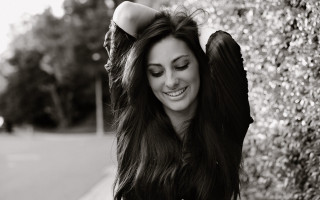 Woman long hair posing bush - a picture in front free wallpaper for desktop