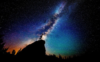 Person rock night sky stars - milky free wallpaper