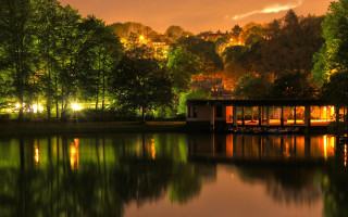 Boathouse night water trees hill - a hill in the background free wallpaper