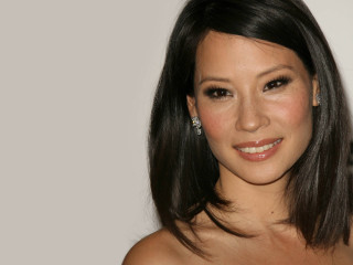 Smiling woman shoulderlength hair strapless - strapless free wallpaper