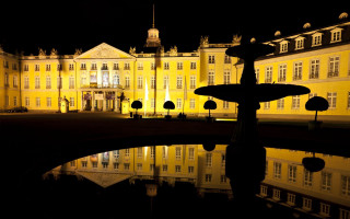 Large building fountain night reflection - berlin secession free wallpaper