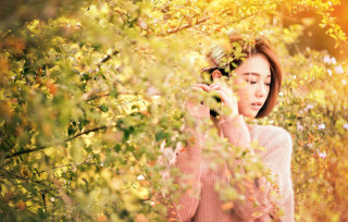 Woman talking cellphone field trees - autumn free wallpaper