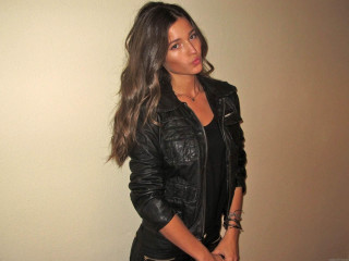 Woman black leather jacket white - brown hair free wallpaper