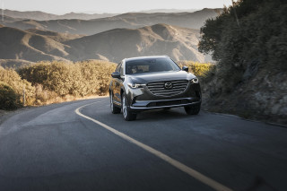 Silver mercedes suv mountain road - a mountain road free wallpaper