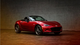 Red sports car dark room 104 - side profile free wallpaper