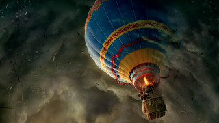 Hot air balloon cloudy sky 2 - a person inside free wallpaper