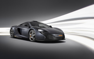 Black sports car motion blur 2 - a black background behind free wallpaper