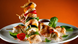 Skewers meat vegetables dipping sauce - a plate of food free wallpaper