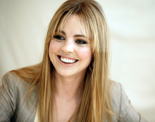 Woman blonde hair smiling gray - tachisme free wallpaper for desktop