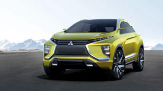 Yellow car driving road mountains - a yellow car free wallpaper