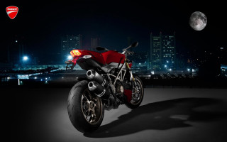 Red motorcycle night city full - a red motorcycle free wallpaper
