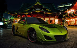 Green sports car night building - a green sports car free wallpaper