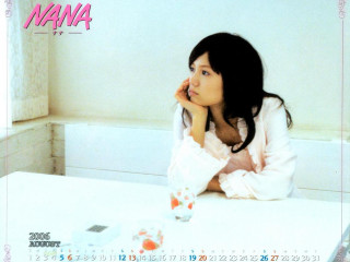 Woman sitting table coffee calendar - a calendar free wallpaper for desktop