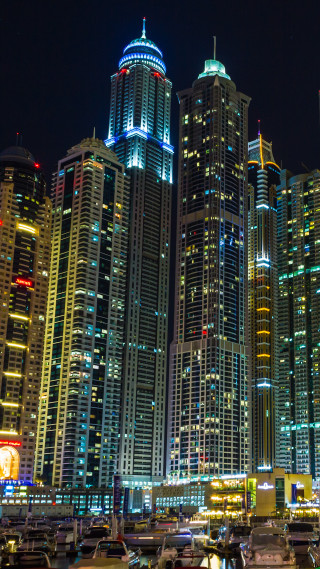 Boats harbor night city skyline - free city wallpaper for mobile