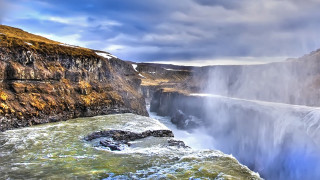Waterfall large cloudy sky background - a waterfall in the foreground free wallpaper