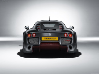Black sports car yellow taillight - a gray wall free wallpaper